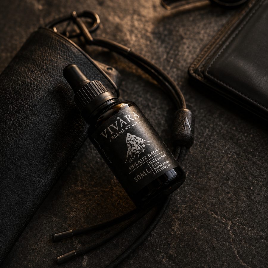 The Element 003 bottle packed beside a leather travel case